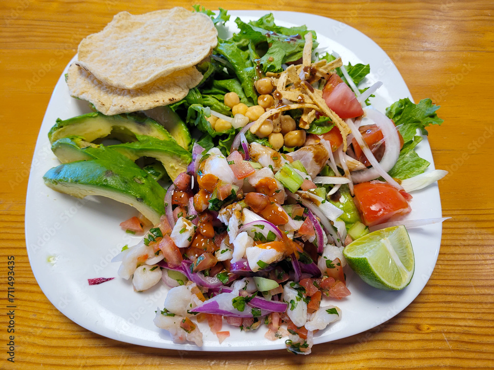 Culinary Artistry: Vibrant Ceviche and Fresh Salad on Wooden Table Culinary Artistry: Vibrant Ceviche and Fresh Salad on Wooden Table