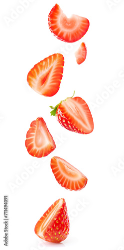 Falling pieces of vibrant strawberry fruits isolated on white background