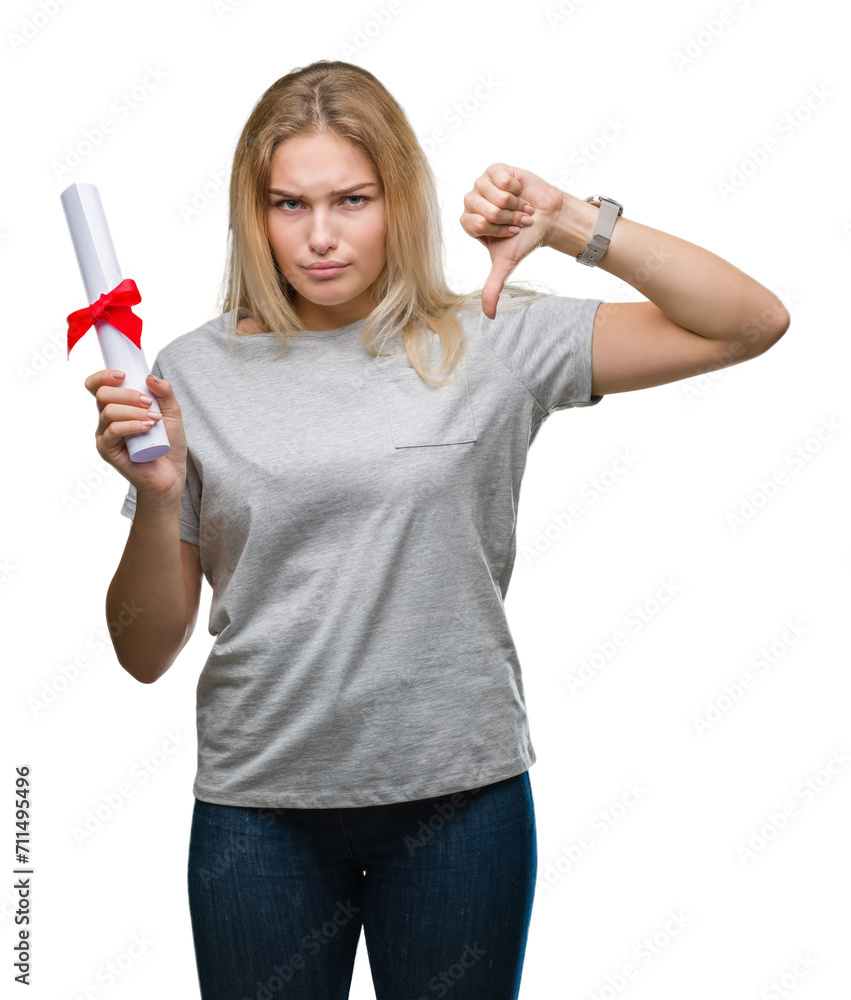 Young caucasian woman holding degree over isolated background with angry face, negative sign showing dislike with thumbs down, rejection concept Young caucasian woman holding degree over isolated background with angry face, negative sign showing dislike with thumbs down, rejection concept