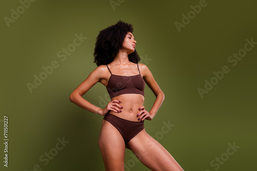 No retouch photo of charming stunning girl thin waist sport dieting slimming concept isolated on khaki color background © deagreez