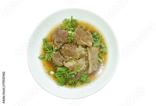 braised beef meat stew topping slice parsley and spring onion on plate dipping chili sauce 