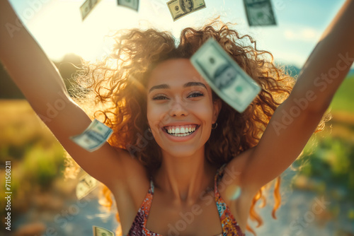 celebration of black woman's financial empowerment. woman with curly hair throwing money in the air at sunny day.