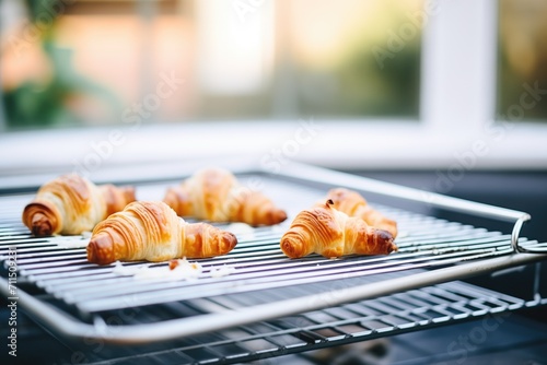 freshly baked danish pastries on cooling racks photo