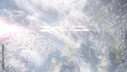 Zoom in from space and focus on Waitakere, New Zealand. 3D Animation. Background for travel intro. Elements of this image furnished by NASA. photo