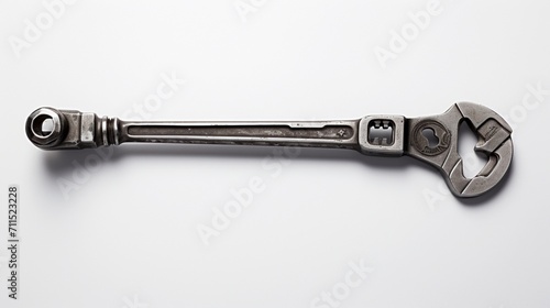 a lone wrench, its utilitarian beauty and timeless design showcased against the pure white background,    © Khan