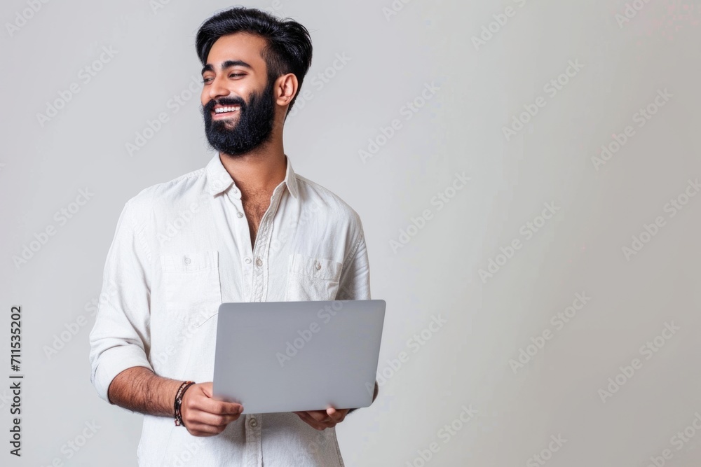 Smiling young man with laptop dreaming and thinking. Smiling young man with laptop dreaming and thinking.
