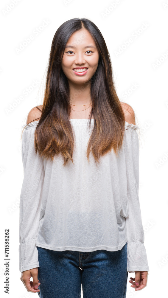 Young asian woman over isolated background with a happy and cool smile on face. Lucky person. Young asian woman over isolated background with a happy and cool smile on face. Lucky person.