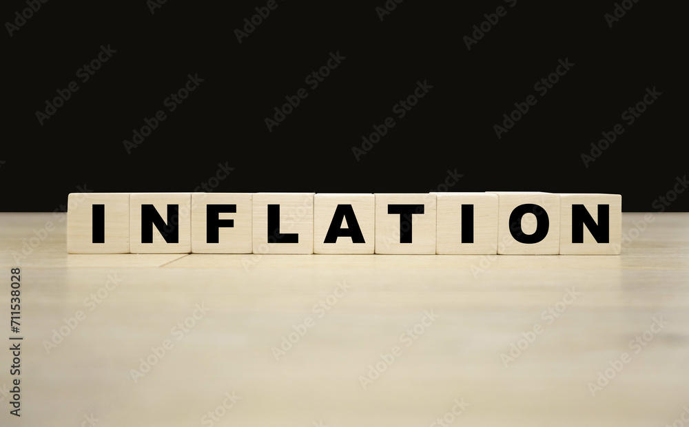 Inflation word written on wooden blocks. Inflation text for your desing, concept.