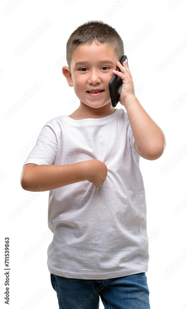 Dark haired little child using a smartphone with surprise face pointing finger to himself Dark haired little child using a smartphone with surprise face pointing finger to himself