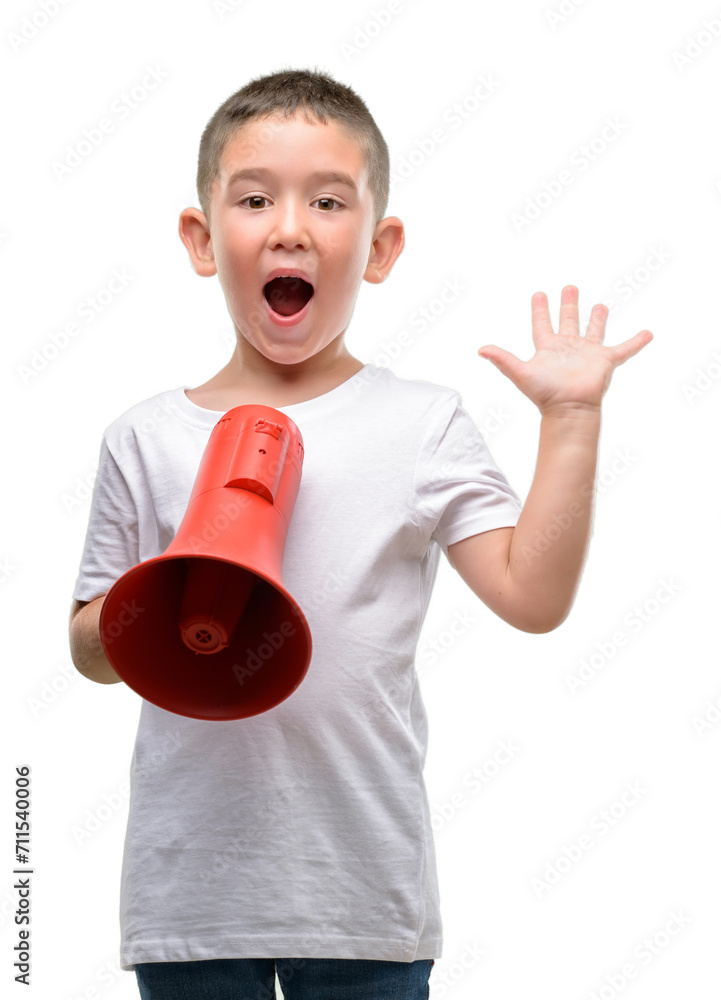 Dark haired little child holding megaphone very happy and excited, winner expression celebrating victory screaming with big smile and raised hands Dark haired little child holding megaphone very happy and excited, winner expression celebrating victory screaming with big smile and raised hands