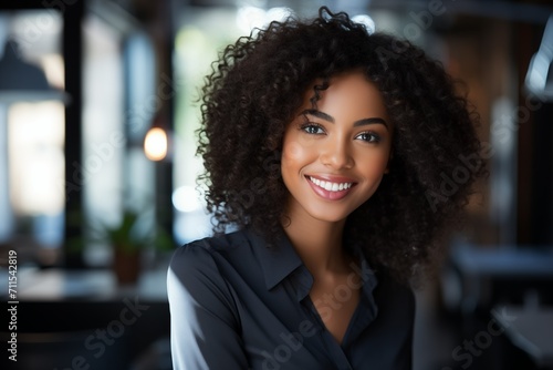 A pretty smiling black businesswoman, a girl in a business room, a beautiful portrait of a woman, a close-up of a young woman's face