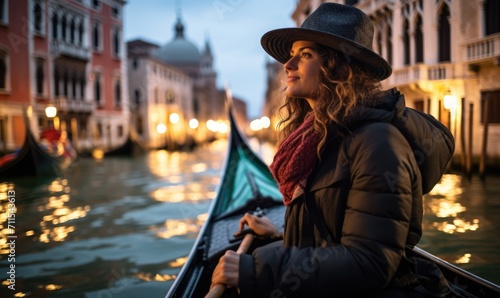 Mystical Venice: Happy Tourist Woman Delights in the Charms of Venice at Night - Gondolas, Golden Light, and Romance Infuse the Evening with Mystery and Elegance.