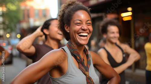 Feminist girl in gray smiling in crowd. © Oksana Tryndiak