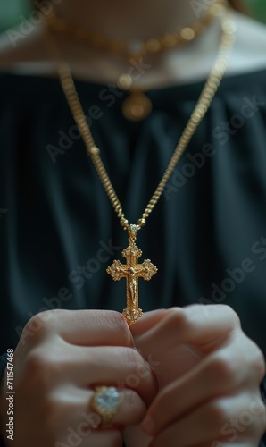 A believer prays, a Christian's holy cross in his hands