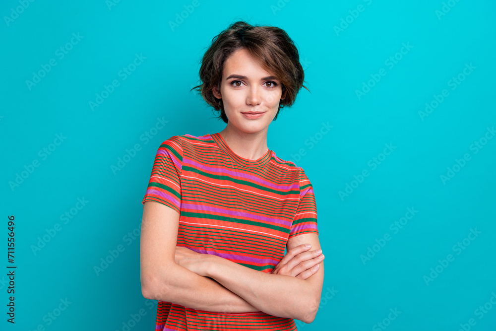 Photo of satisfied adorable woman with bob hairstyle dressed striped t-shirt holding palms folded isolated on teal color background Photo of satisfied adorable woman with bob hairstyle dressed striped t-shirt holding palms folded isolated on teal color background