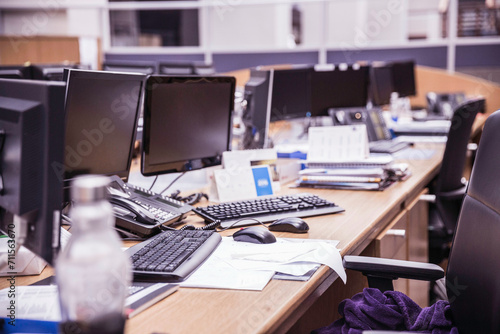Wallpaper Mural Row of unoccupied computers on desks in a large open office space. Cape Town, South Africa Torontodigital.ca