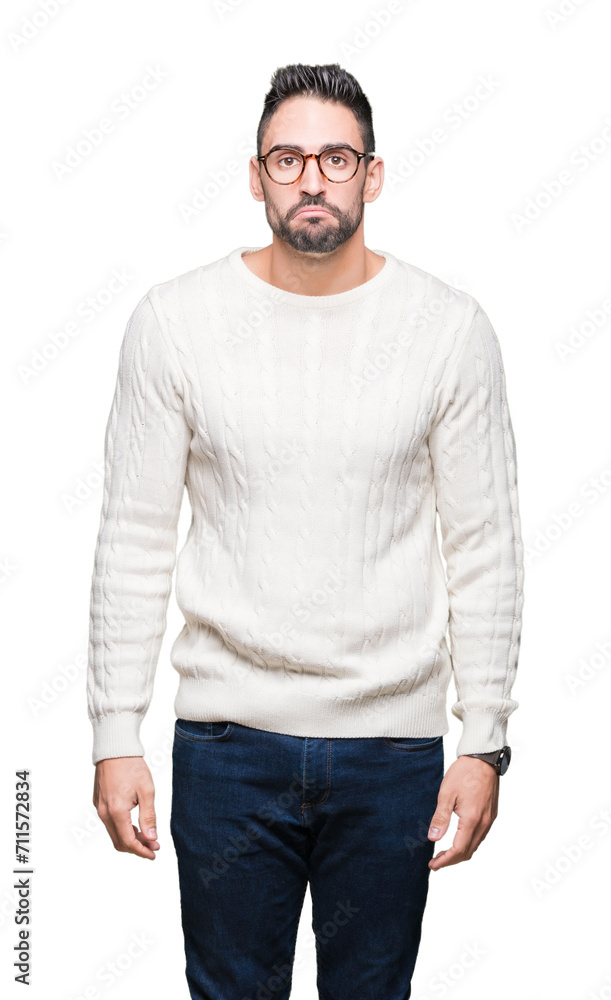 Young handsome man wearing glasses over isolated background depressed and worry for distress, crying angry and afraid. Sad expression. Young handsome man wearing glasses over isolated background depressed and worry for distress, crying angry and afraid. Sad expression.