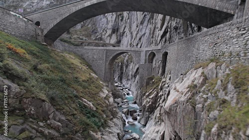 Aerial view of Devil's Bridge (Teufelsbrucke) over of Schollenen Gorge (Schollenenschlucht) in Andermatt, Switzerland photo