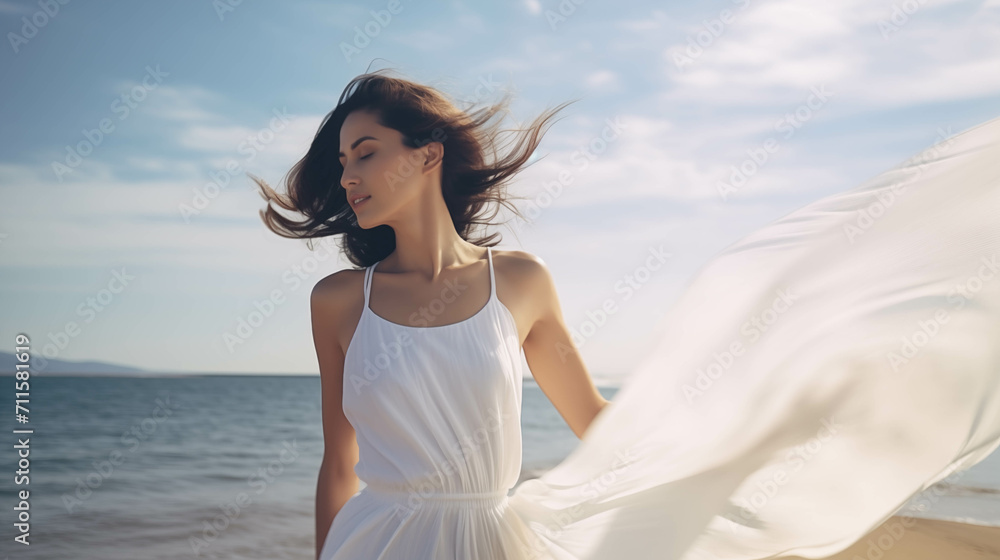 Caucasian woman in white dress walks along the beach. Caucasian woman in white dress walks along the beach.