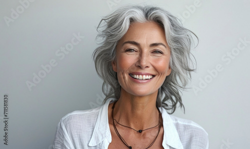 Fotografia, Obraz 50s middle aged old woman looking at camera isolated on white background advertising dry skin care treatment anti age skincare beauty, plastic surgery, cosmetology procedures