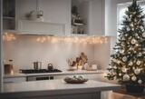 Modern White Kitchen with Christmas Tree Hanging Lights