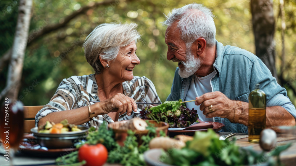 Healthiness and happiness go hand in hand. Shot of a happy older couple enjoying a healthy lunch together outdoors. Healthiness and happiness go hand in hand. Shot of a happy older couple enjoying a healthy lunch together outdoors.