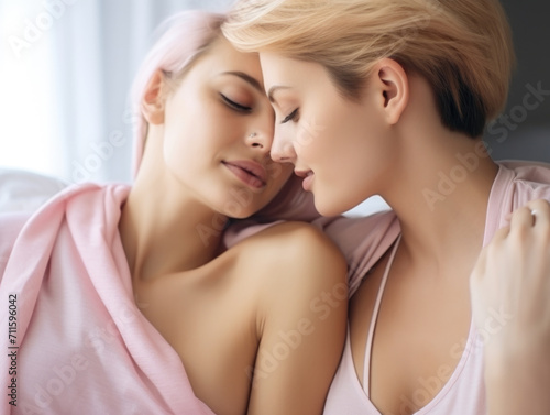 Two women in a loving embrace with closed eyes.