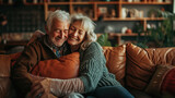 Portrait, hug and senior couple on sofa for bonding, healthy marriage and relationship in living room. Retirement, love and happy man and woman on couch embrace for trust, commitment and care at home
