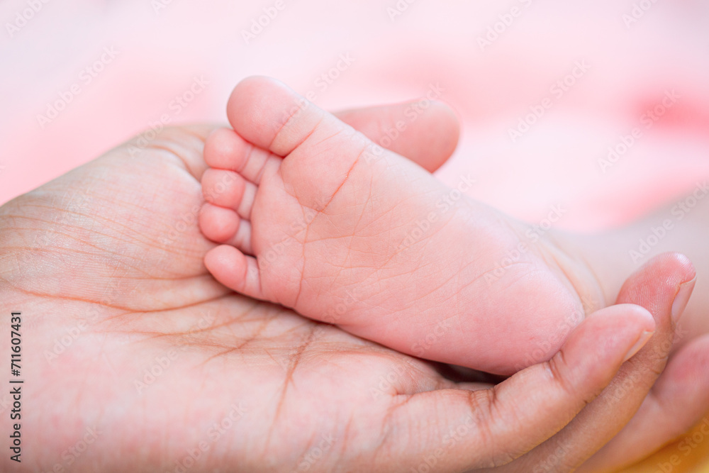 baby feet,Baby feet in hands, mother, mother and her child, happy family concept, beautiful concept illustration of childbirth. baby feet,Baby feet in hands, mother, mother and her child, happy family concept, beautiful concept illustration of childbirth.