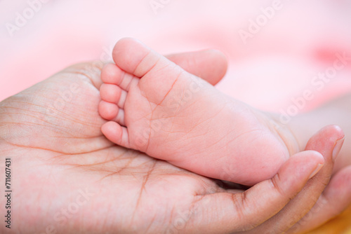 baby feet,Baby feet in hands, mother, mother and her child, happy family concept, beautiful concept illustration of childbirth.