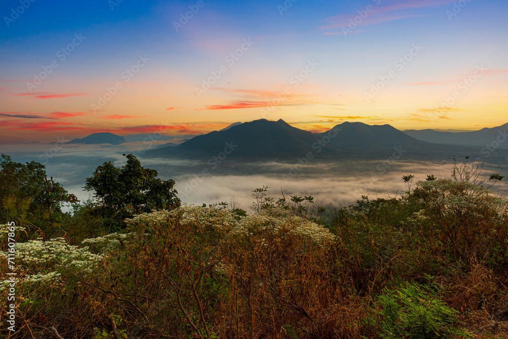 Mountain and sky scenery in the morning,Mountain valley during sunrise. Beutiful natural landsscape in the summer time.