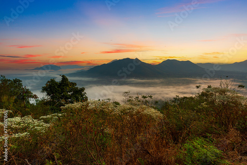 Mountain and sky scenery in the morning,Mountain valley during sunrise. Beutiful natural landsscape in the summer time.