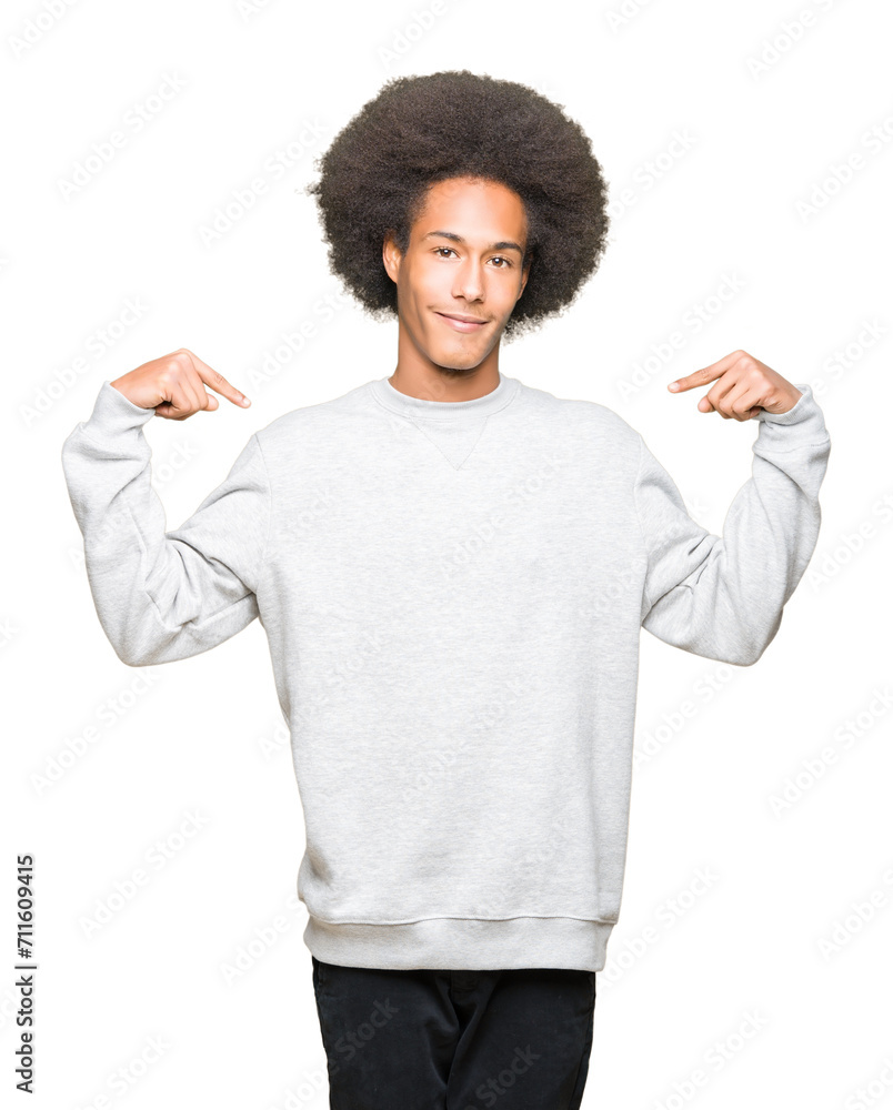 Young african american man with afro hair wearing sporty sweatshirt clueless and confused expression with arms and hands raised. Doubt concept. Young african american man with afro hair wearing sporty sweatshirt clueless and confused expression with arms and hands raised. Doubt concept.