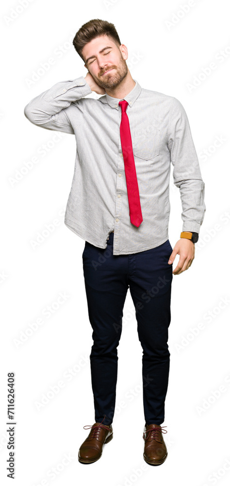 Young handsome business man Suffering of neck ache injury, touching neck with hand, muscular pain Young handsome business man Suffering of neck ache injury, touching neck with hand, muscular pain