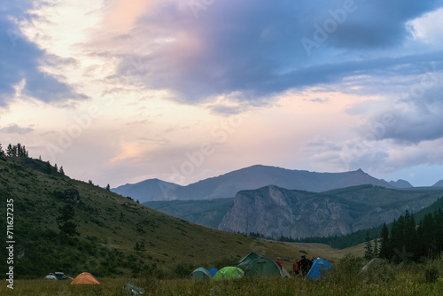 Camping in the mountains at sunset