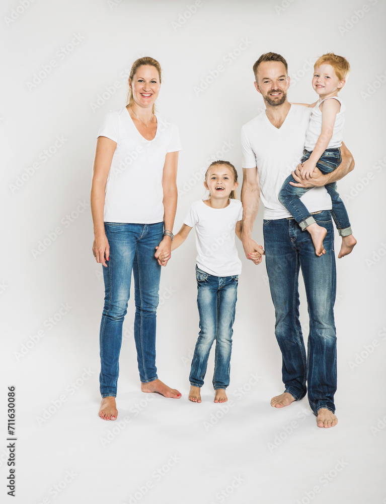 Portrait of family in studio with white background. Portrait of family in studio with white background.