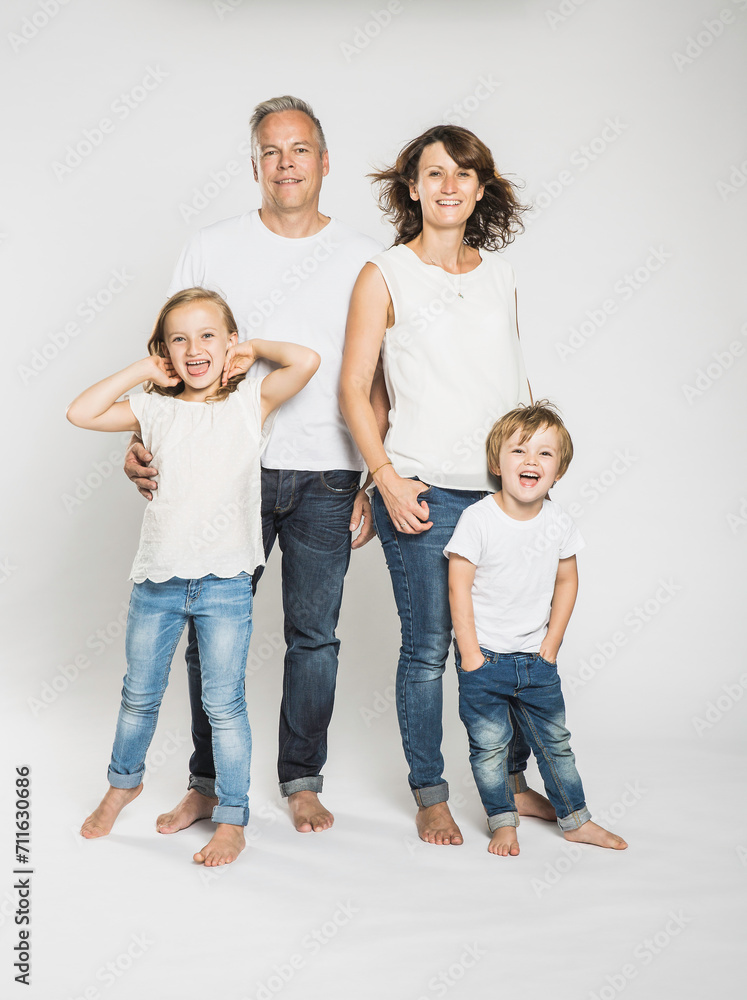 Portrait of Family in a studio with white background. Portrait of Family in a studio with white background.