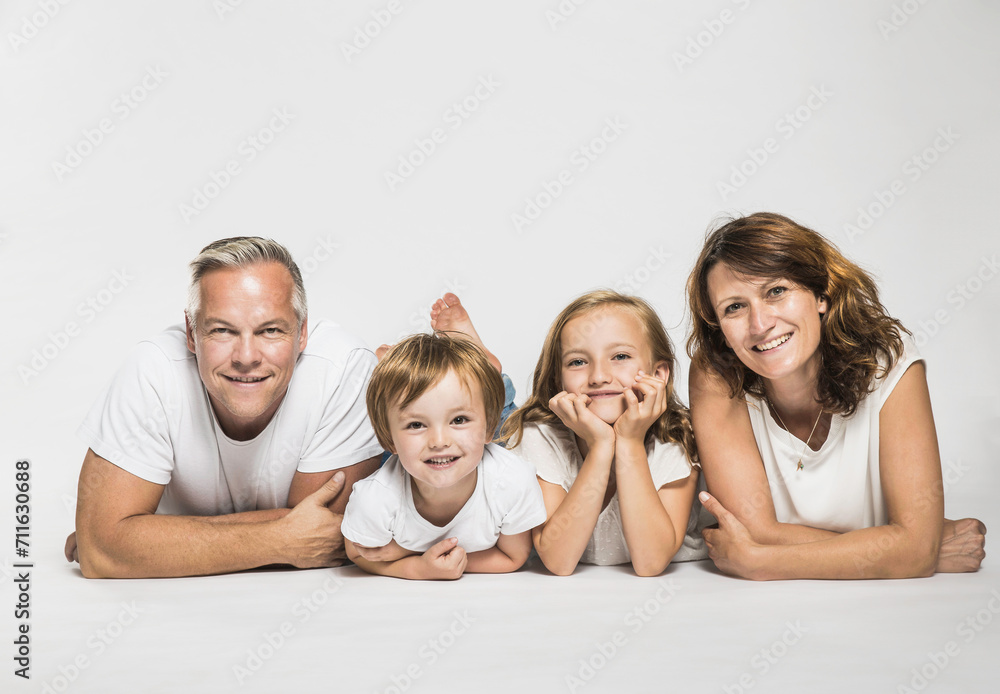 Portrait of Family in a studio with white background. Portrait of Family in a studio with white background.