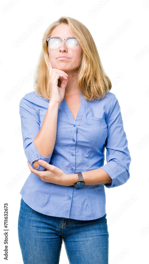 Beautiful young business woman over isolated background with hand on chin thinking about question, pensive expression. Smiling with thoughtful face. Doubt concept. Beautiful young business woman over isolated background with hand on chin thinking about question, pensive expression. Smiling with thoughtful face. Doubt concept.