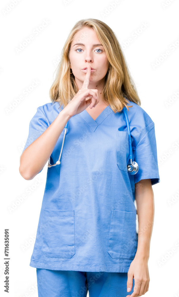 Beautiful young doctor woman wearing medical uniform over isolated background asking to be quiet with finger on lips. Silence and secret concept. Beautiful young doctor woman wearing medical uniform over isolated background asking to be quiet with finger on lips. Silence and secret concept.