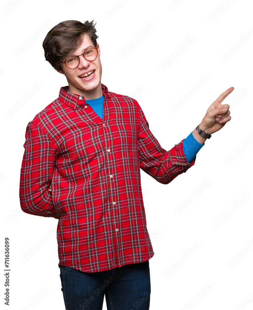 Young handsome man wearing glasses over isolated background with a big smile on face, pointing with hand and finger to the side looking at the camera. Young handsome man wearing glasses over isolated background with a big smile on face, pointing with hand and finger to the side looking at the camera.