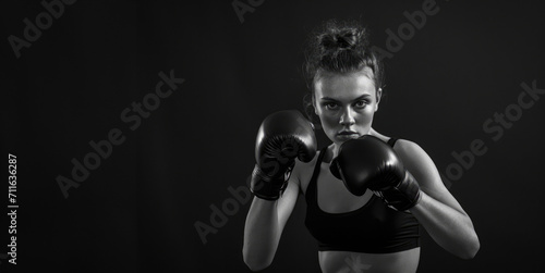 Generative AI, Woman training boxing wearing boxing gloves, female boxer  © Rymma
