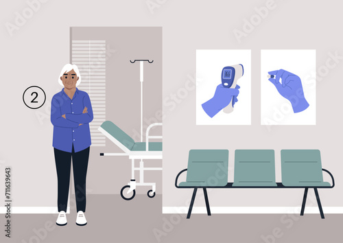 An elderly individual patiently waits in the hospital corridor, anticipating their annual checkup