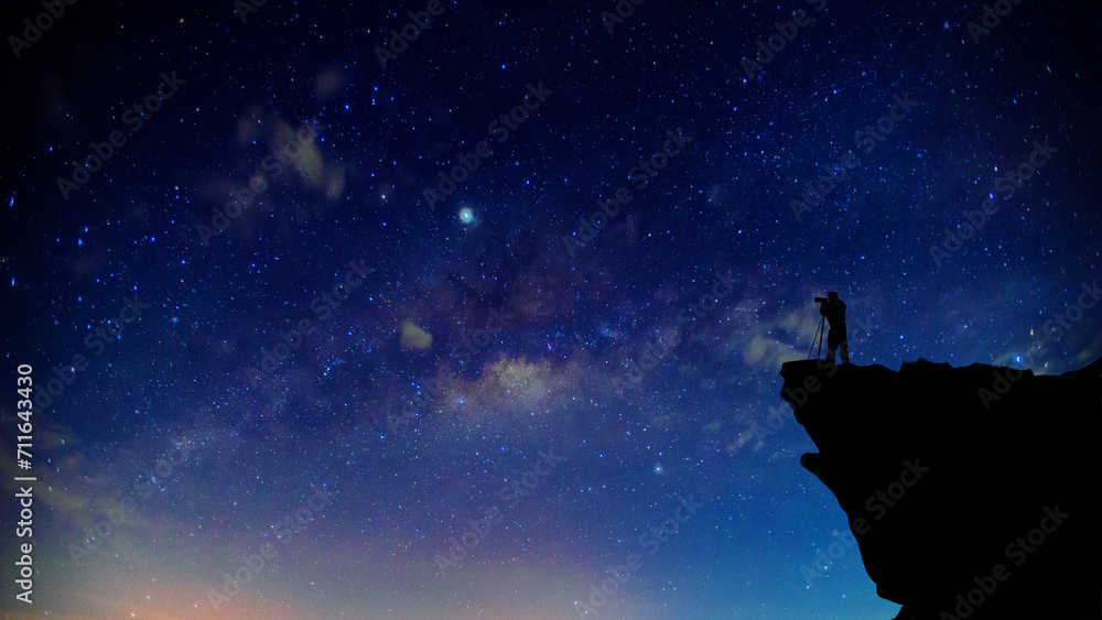 Obraz premium Amazing Panorama blue night sky milky way and star on dark background.Universe filled with stars, nebula and galaxy with noise and grain.