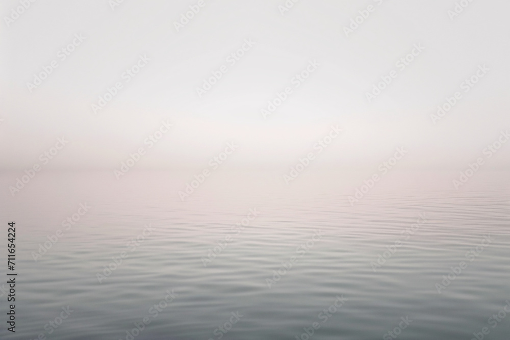 Fototapeta premium Misty sea horizon at dawn with soft light