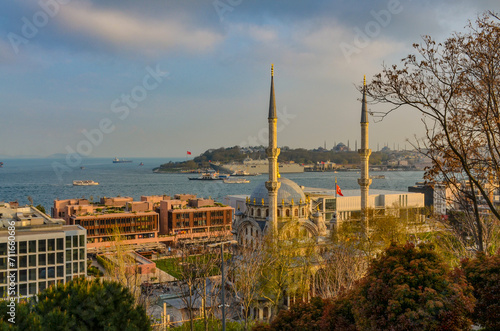 Nusretiye Mosque and Galata port scenic view from Sanatkarlar Park in Cihangir (Istanbul, Turkey) photo