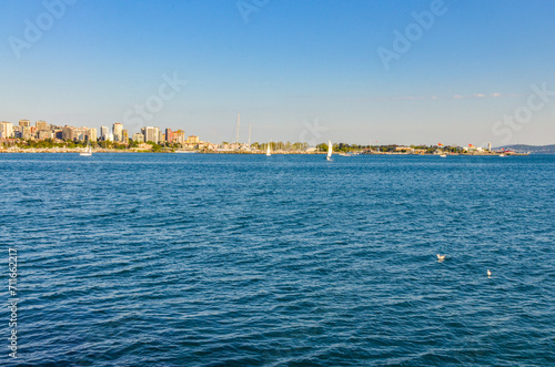Fenerbahce park and yachts in Bosporus scenic view from Moda Pier (Istanbul, Turkiye)