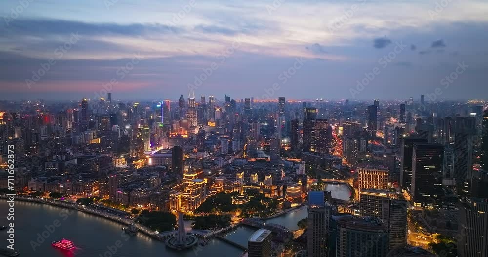 Aerial forward shot of Shanghai downtown buildings skyline at night Aerial forward shot of Shanghai downtown buildings skyline at night