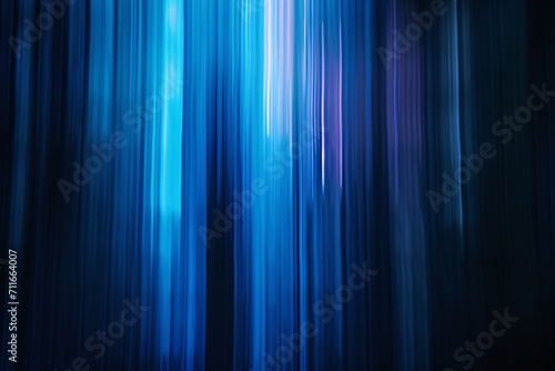 Abstract blue light streaks with a dark background wallpaper photo