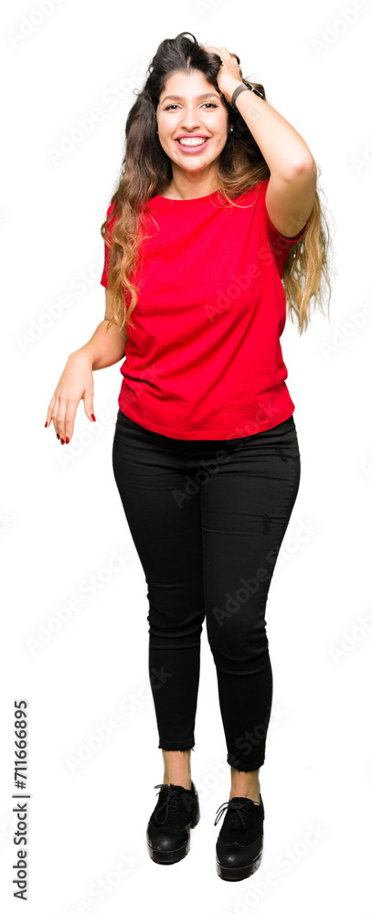Obraz premium Young beautiful woman wearing casual t-shirt Smiling confident touching hair with hand up gesture, posing attractive